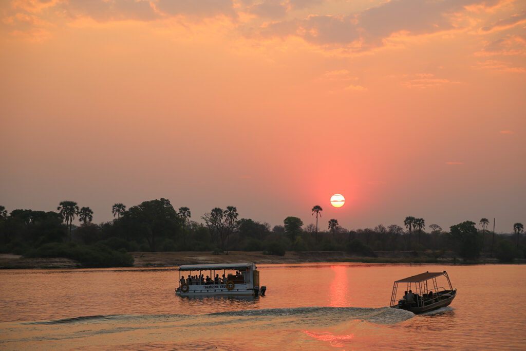 Boat cruises at sunset in Victoria Falls | Go2Africa
