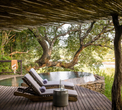 All of the suites at Singita have a deck that guests can enjoy with a refreshing drink in hand and feet in their very own plunge pool.