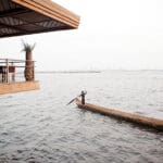 From the banks of the Congo river, watch the boats go by and catch a glimpse of Kinshasa, the capital city of the DRC