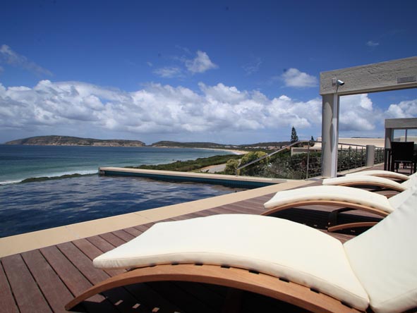 There are plenty of luxurious accommodation options in Plett; make sure you stay somewhere with a beach view!
