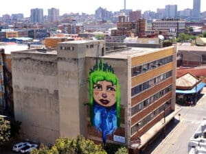 The Falko mural graces the Johannesburg skyline.