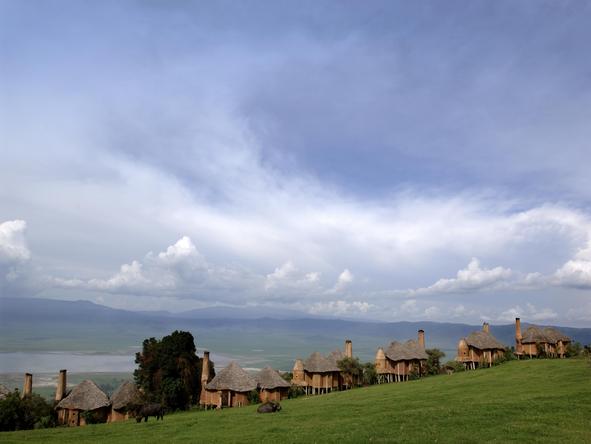 These luxury suites resemble a magical Maasai Village, perched on stilts on the lip of the Ngorongoro Crater.