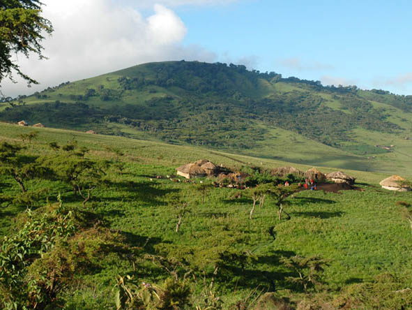 Traditional Maasai villages dot the landscape as you approach the Ngorongoro Crater.