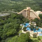 Understated luxury & elegance are the hallmarks of The Cascades Hotel, set amid tropical gardens & close to many sporting facilities.