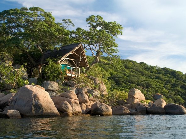 With only six chalets on offer, perfectly-located Mumbo Island Camp is one of the most intimate & romantic accommodations on Lake Malawi.