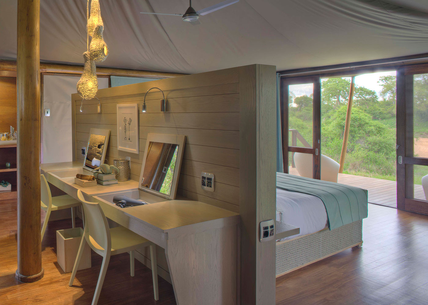 Luxurious tented suites are set on raised on platforms with private wooden decks.