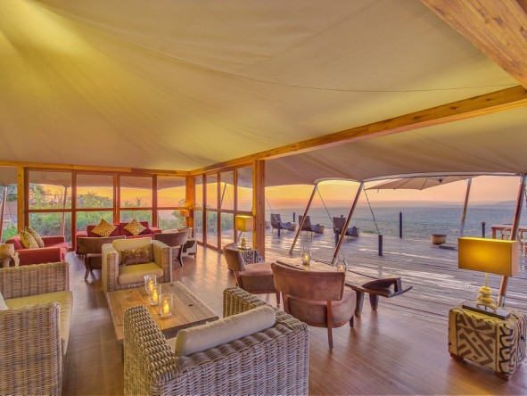 The communal lounge showcases unhindered views across Laikipia’s mottled landscape, all the way to Mount Kenya.