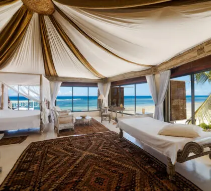 The master bedroom is the draped Turret Suite and boasts 270-degree ocean views.