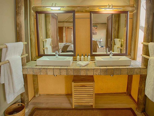 The en suite bathrooms feature flush toilets, a walk-in shower and complimentary toiletries. 