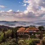 Aerial view of Virunga Lodge and dramatic Rwanda landscapes