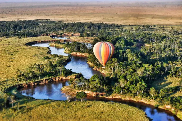 Glide over the Masai in a hot air balloon. 