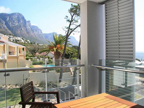 Enjoy your morning coffee in the soft sunlight on the private balcony
