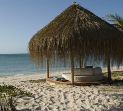 Laze on the beach all day in the shady comfort of your own gazebo.