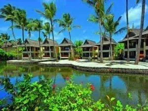 Le Prince Maurice dispone de varias villas de lujo con vistas a piscinas y jardines tropicales.