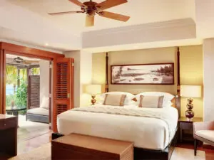 Wooden doors slide back to reveal your outdoor terrace, complete with garden or ocean views.
