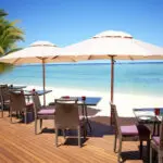 Enjoy a drink in the shade just a few steps away from the Indian Ocean.
