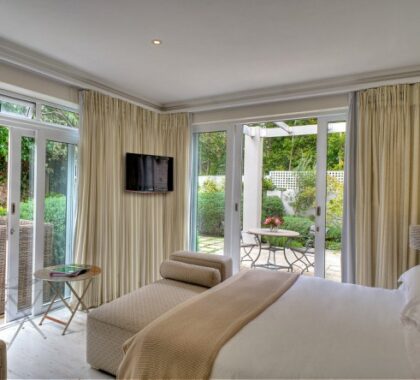 The garden suite is bright and airy, with two patio areas to sit out and enjoy.