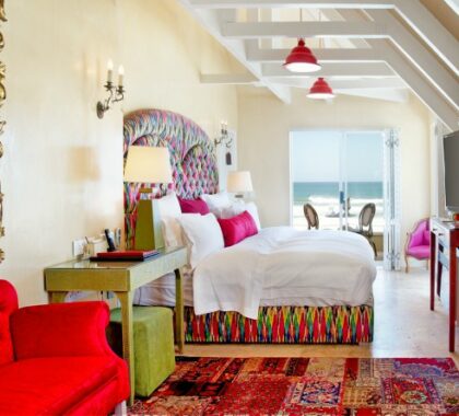 The sea-facing suite is a vibrantly decorated white walled suite with breath-taking sea views.