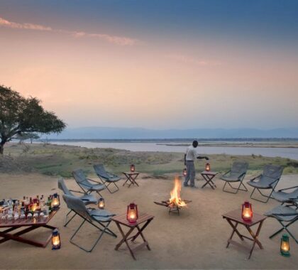 Sip on tall drinks around the boma fire as you marvel at the spectacular view of the Zambezi River.