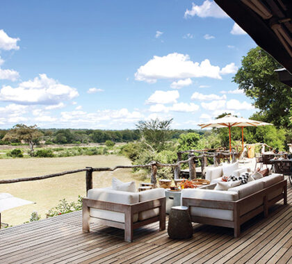 The expansive wooden deck is the place to be - you can spend a relaxing afternoon watching animals by the river.