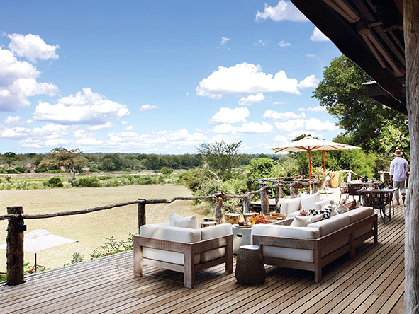 The expansive wooden deck is the place to be - you can spend a relaxing afternoon watching animals by the river.