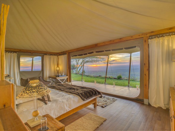 All suites at Loisaba Tented Camp have a private deck with lounger chairs and a superb panoramic view.