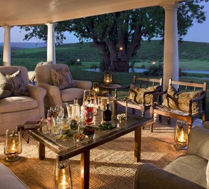 After exhilarating game viewing, enjoy sundowners on the verandah while overlooking the waterhole.