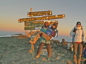 You made it! The classic shot taken at Uhuru Peak.