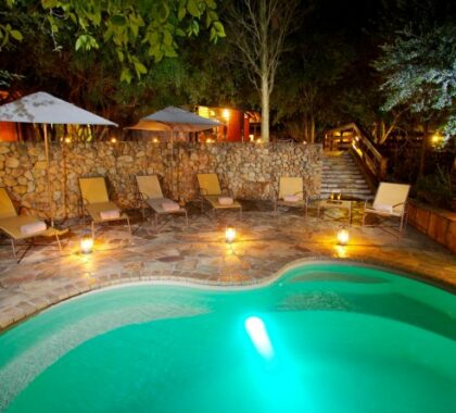 A lovely pool area allows you to cool off after your morning game drive or enjoy a dip before dinner.