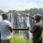 See the mighty Victoria Falls.