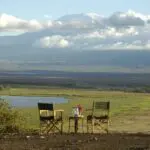 Enjoy a private meal with a stunning view over the savannah.