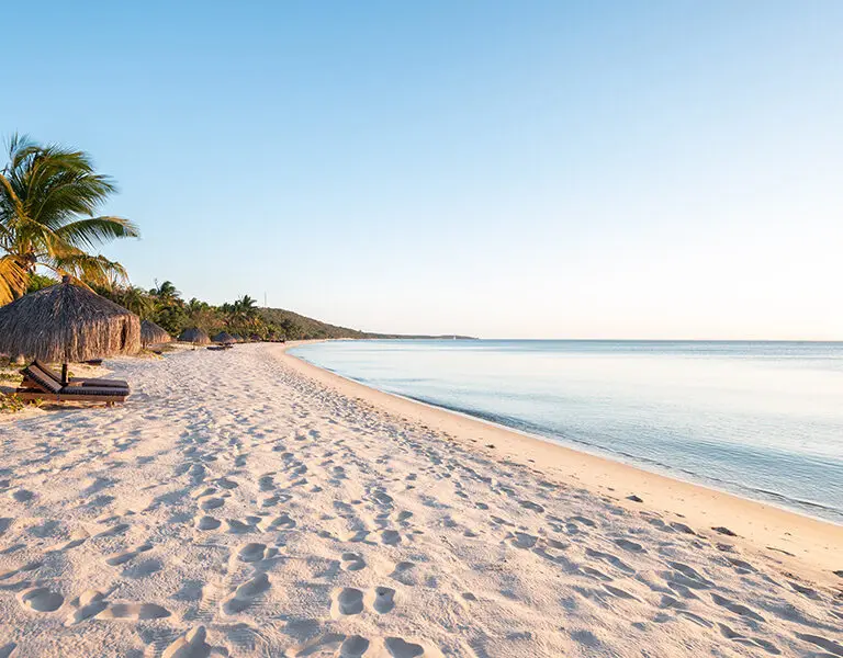 The beach at golden hour at Anantara Bazaruto Island Resort