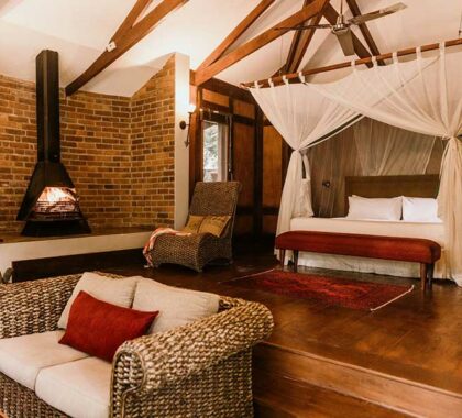 Cottage interior at Arusha Coffee Lodge.