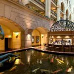 This sophisticated hotel has a bar and koi pond.