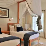 The suites are either furnished with twin or double beds.