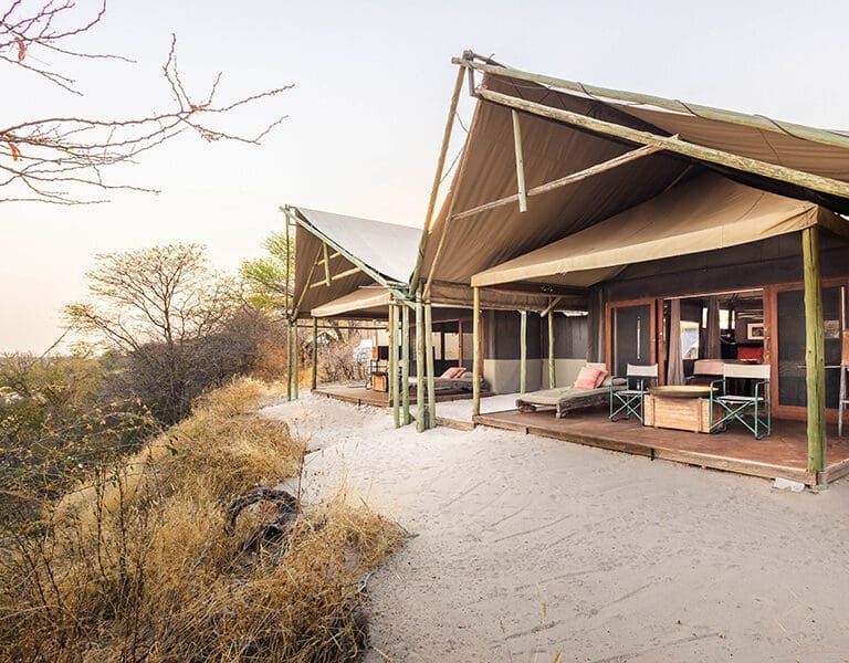 The Family Tent at Meno a Kwena has one double room with an additional room with three twin beds.