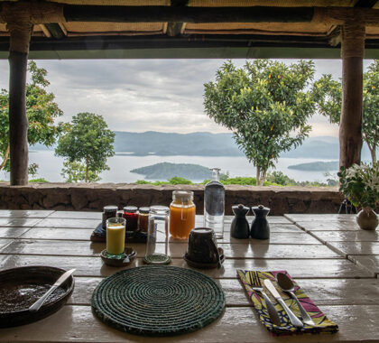 Breakfast with lake and mountain views at Virunga Lodge.