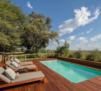 Cool off from the heat with a swim in Camp Moremi's pool.