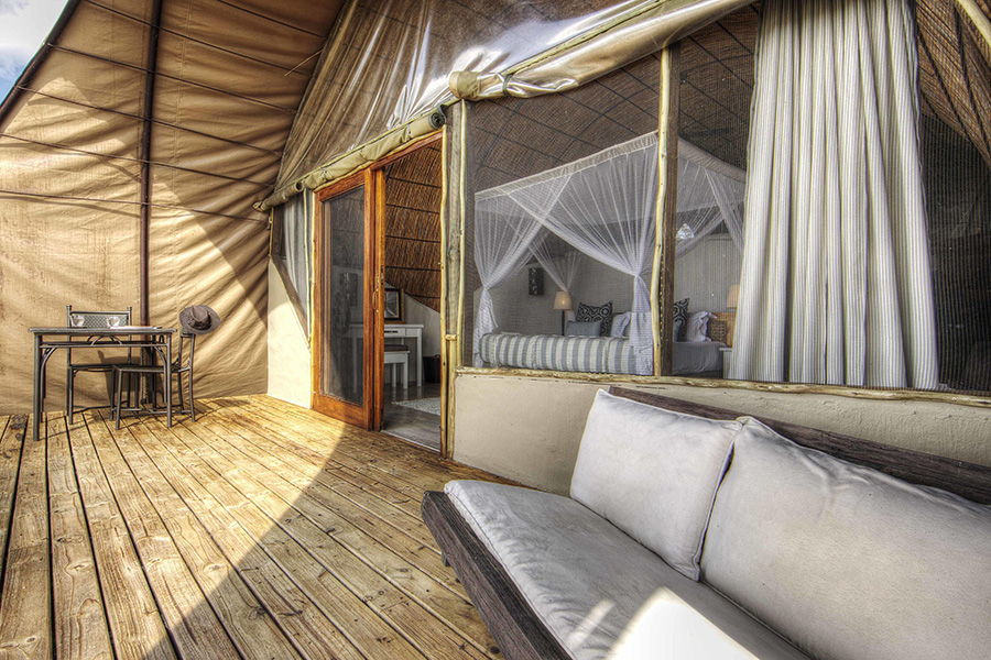 Each room has a private, furnished veranda with exceptional views out over the water channel and Moremi plains. 