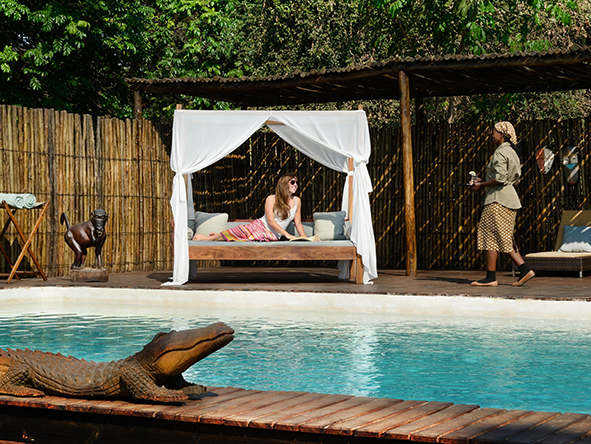 Lounge on the deck of Chiawa Camp's sizeable swimming pool.