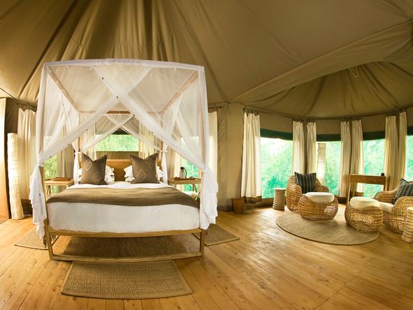 The tents have luxurious four-poster beds, a lounge area and are extremely spacious.
