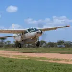 Arrive by light aircraft. Connects easily to a safari.