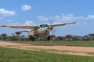Arrive by light aircraft. Connects easily to a safari.