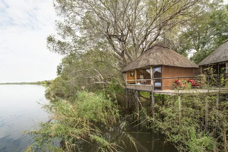 Chundukwa River Lodge's stilted River Chalets all overlook the Zambezi River.