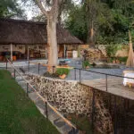 The lounge and deck at Chundukwa River Lodge is a peaceful retreat.