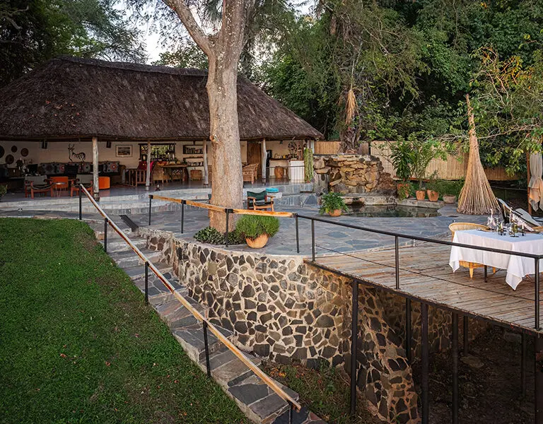 The lounge and deck at Chundukwa River Lodge is a peaceful retreat.