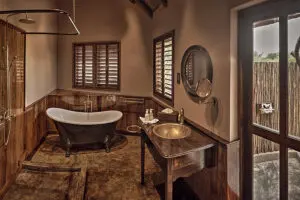 Start each day with an alfresco shower and treat yourself to leisurely soaks in the Victorian-style bathtub.