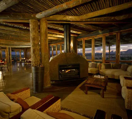 Cosy up by the fireplace.