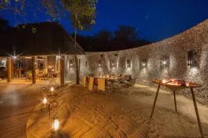 Relax around the fire and swopping stories in the open-air boma.
