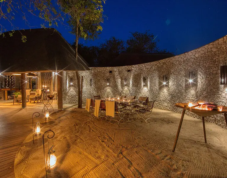Relax around the fire and swopping stories in the open-air boma.